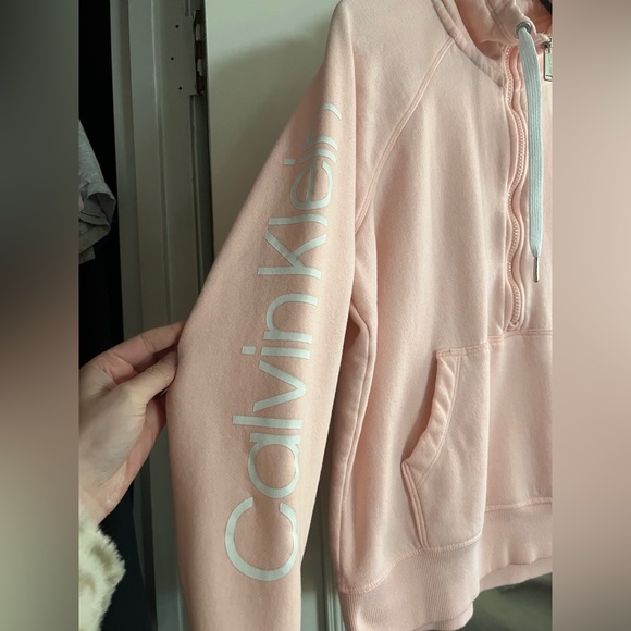 Calvin Klein pullover in peachy pink. Size is small. - Picture 3 of 3